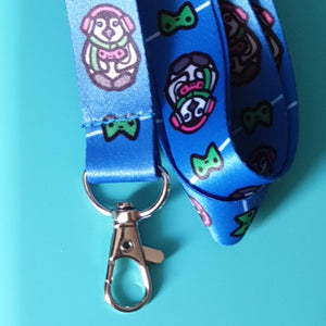 Gamer Penguin lanyard- has silver lobster clasp attachment. Does not come with card holder. 