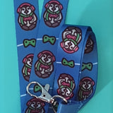 Gamer Penguin lanyard- has silver lobster clasp attachment. Does not come with card holder.