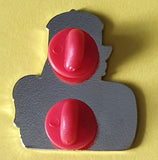 The Buffet Bandit photo- shows back of badge with two red rubber clutches