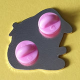 Summer Rose photo- shows back of badge with two pink rubber clutches