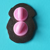 Gamer Penguin photo- shows back of badge with two pink rubber clutches